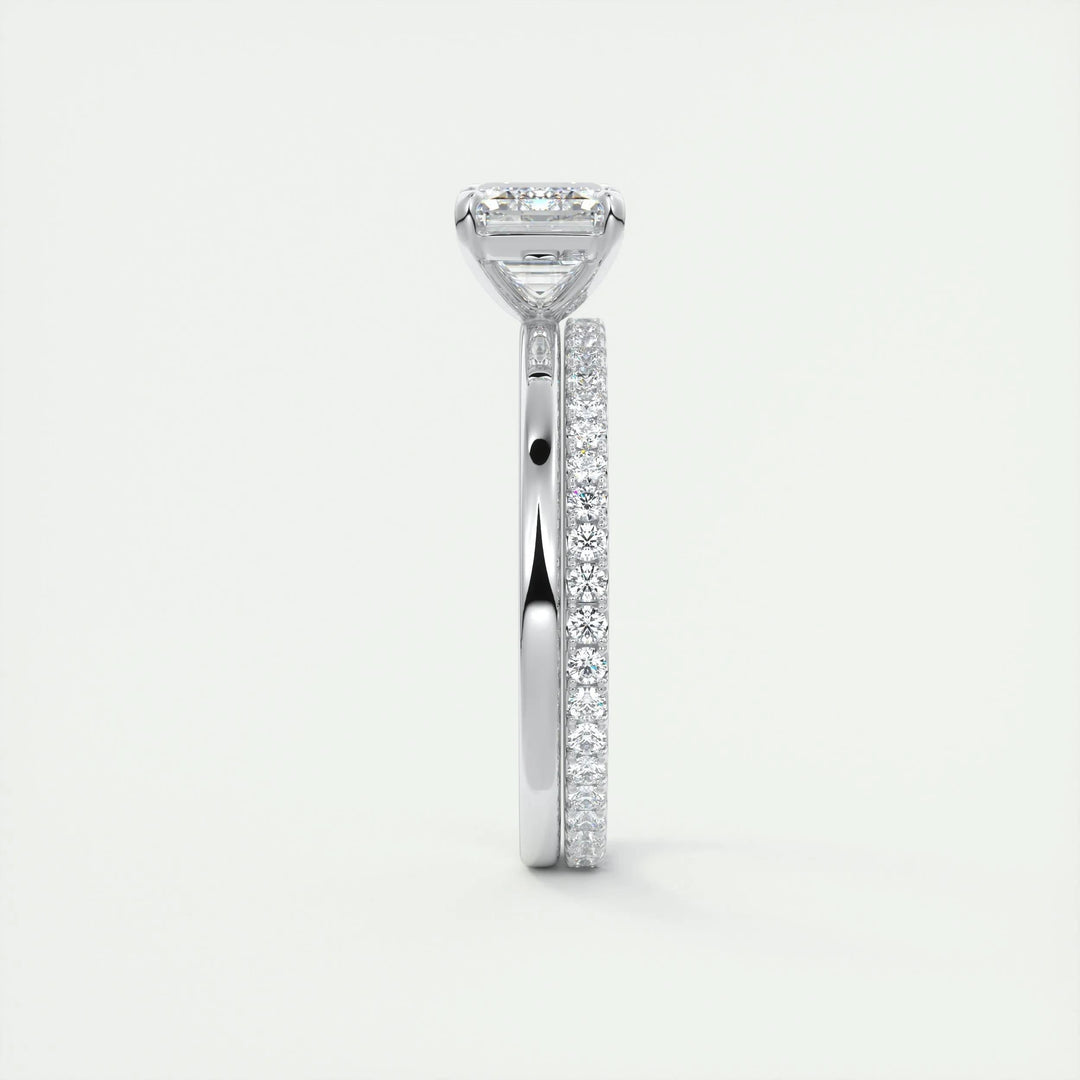 Emerald cut east west engagement ring with IGI certified center diamond