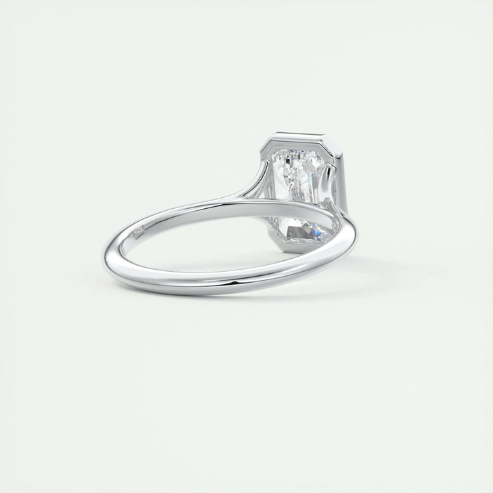 Emerald cut engagement ring side view showing band detail