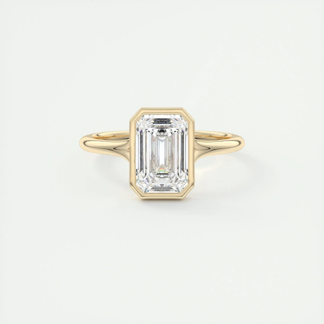 Emerald cut diamond ring worn on hand