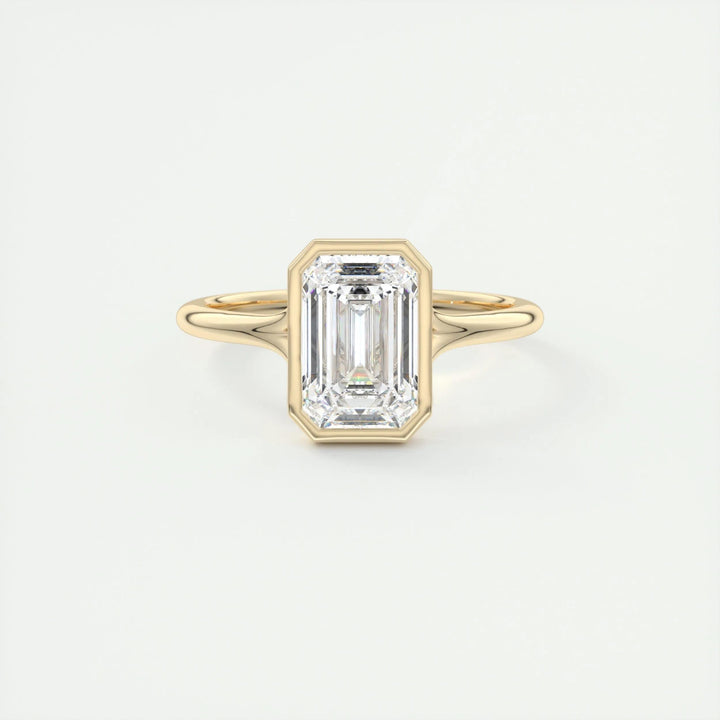 Emerald cut diamond ring worn on hand