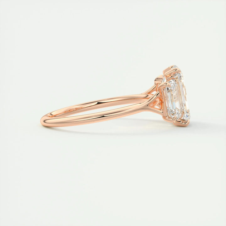 Emerald three stone lab grown diamond ring fitted on finger