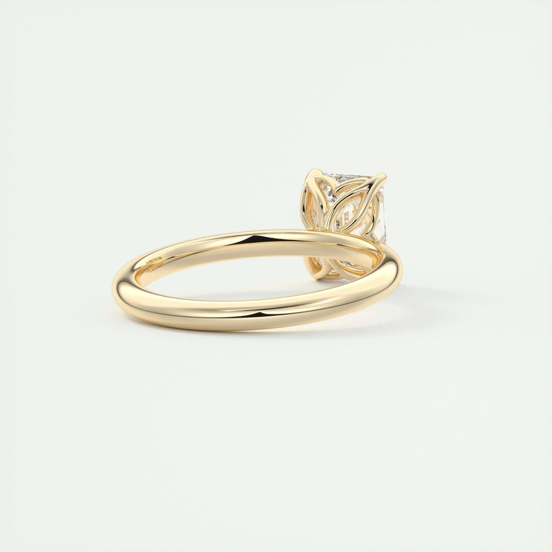 Emerald cut diamond ring worn on hand