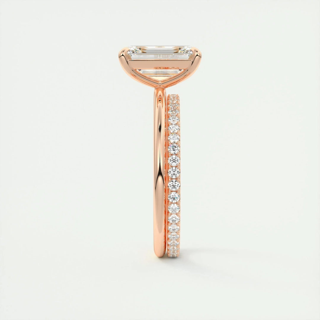 Emerald cut solitaire engagement ring shown in real-life wear