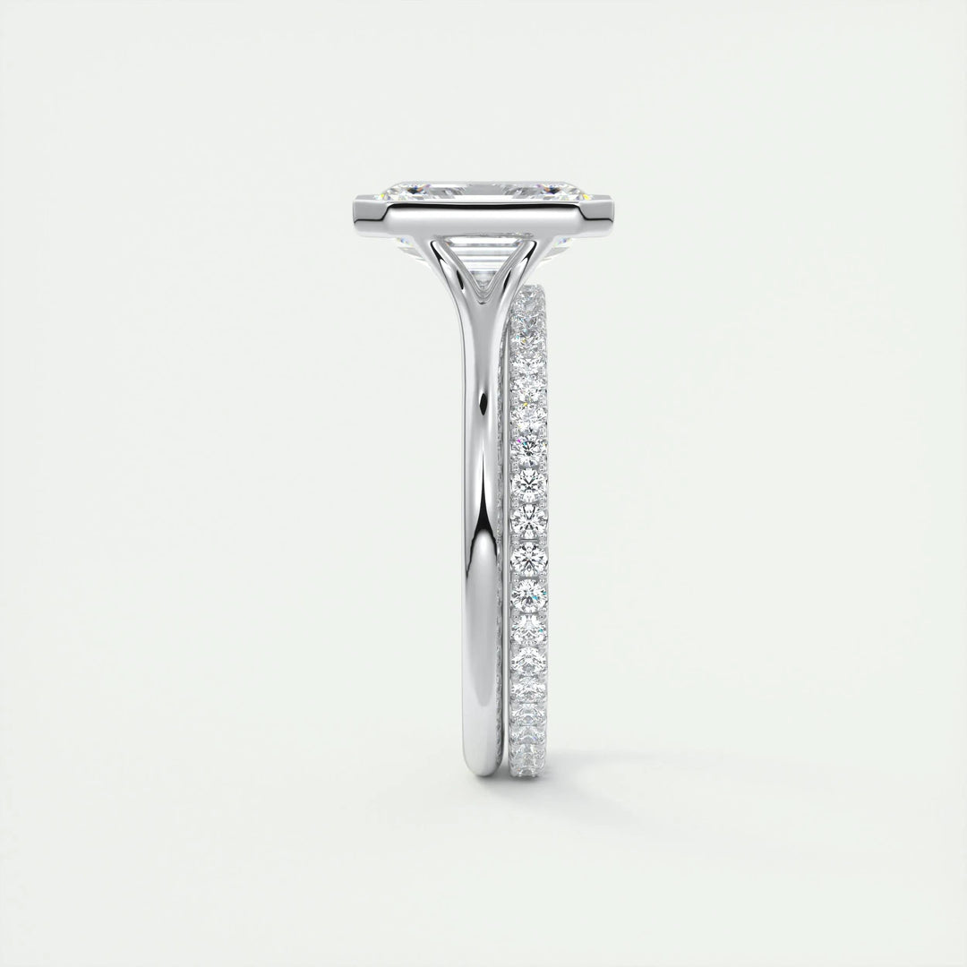 Profile view of emerald cut bezel engagement ring band