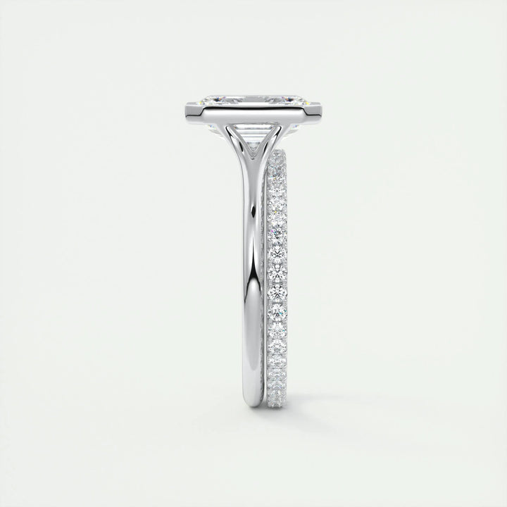 Profile view of emerald cut bezel engagement ring band