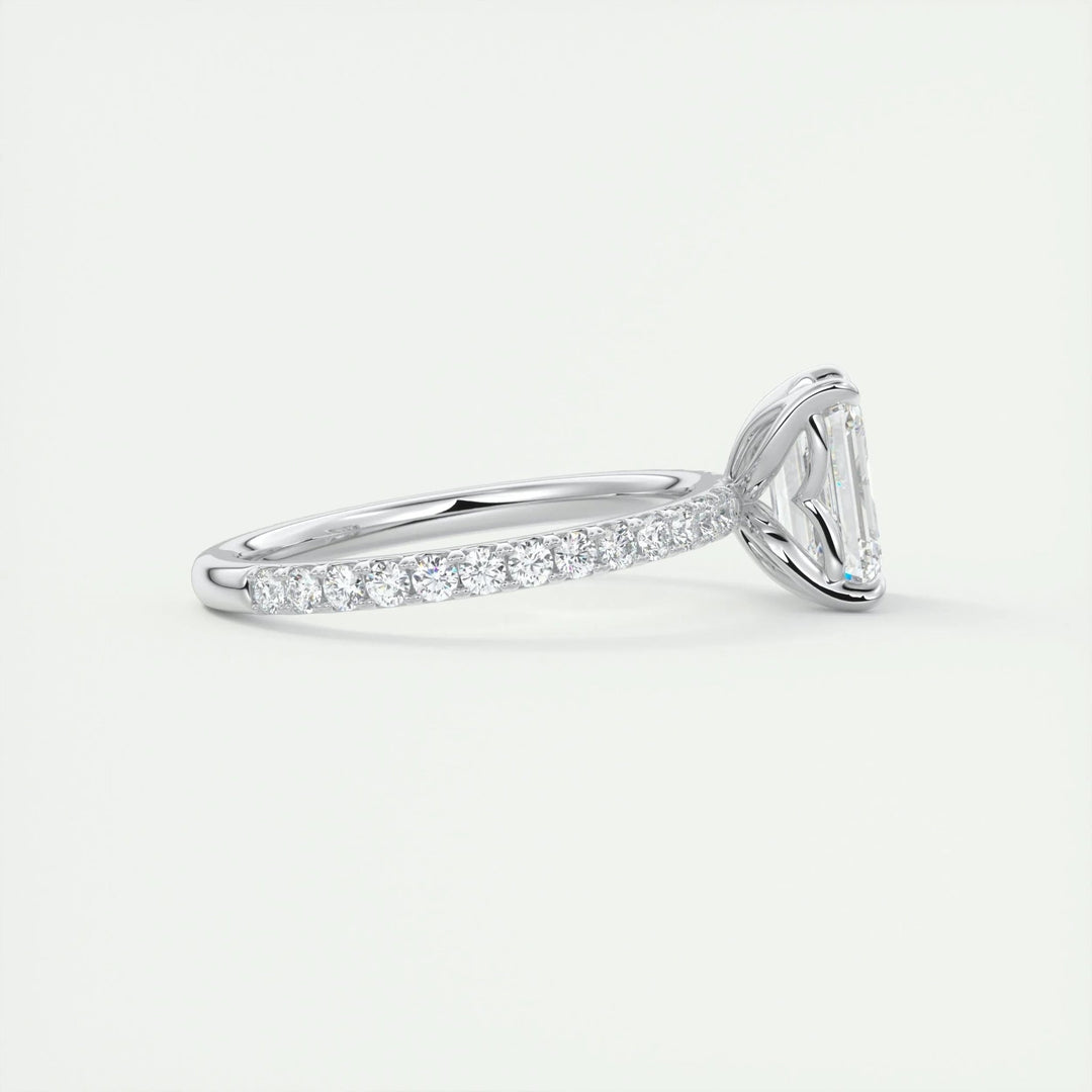 Emerald pave engagement ring close-up highlighting diamond sparkle