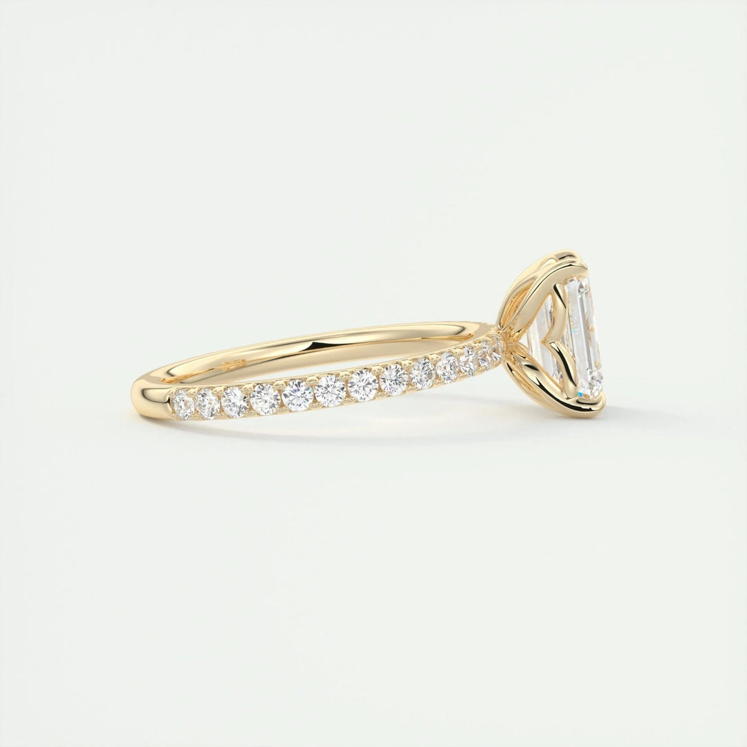 Emerald pave engagement ring finished in polished solid gold