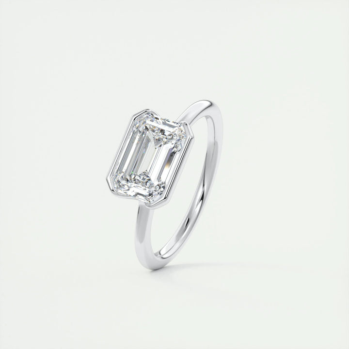 Emerald solitaire engagement ring with IGI certificate and packaging