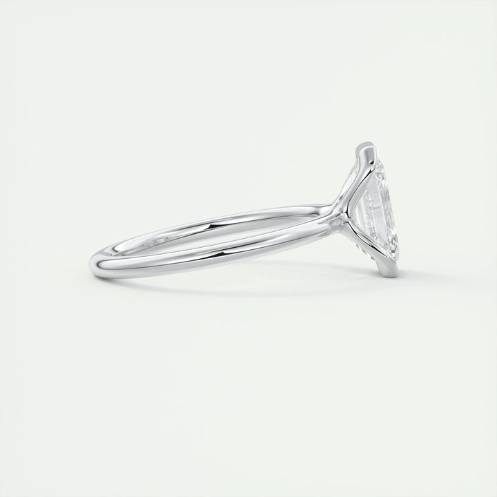 Classic emerald solitaire engagement ring crafted for everyday wear