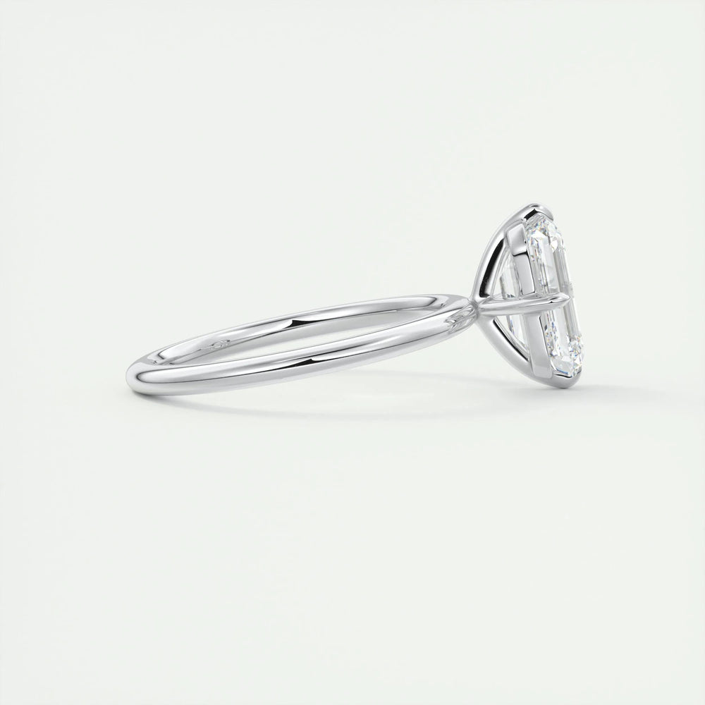 Classic emerald solitaire engagement ring crafted for everyday wear