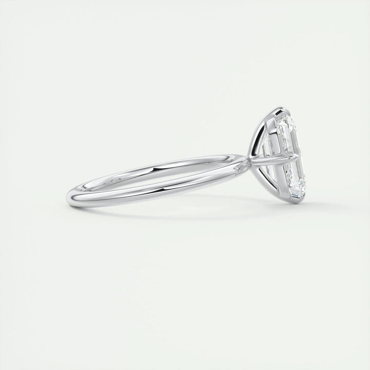 Classic emerald solitaire engagement ring crafted for everyday wear