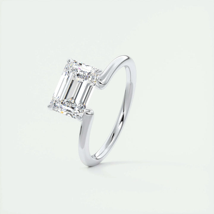 Emerald solitaire lab grown diamond ring side profile in gold setting