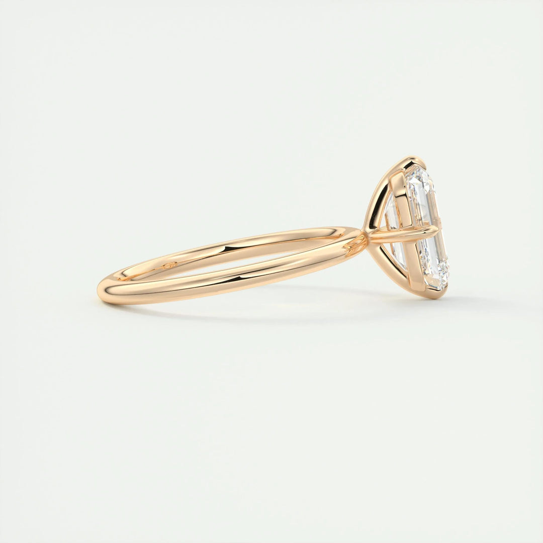 Emerald solitaire lab grown diamond ring side profile in gold setting
