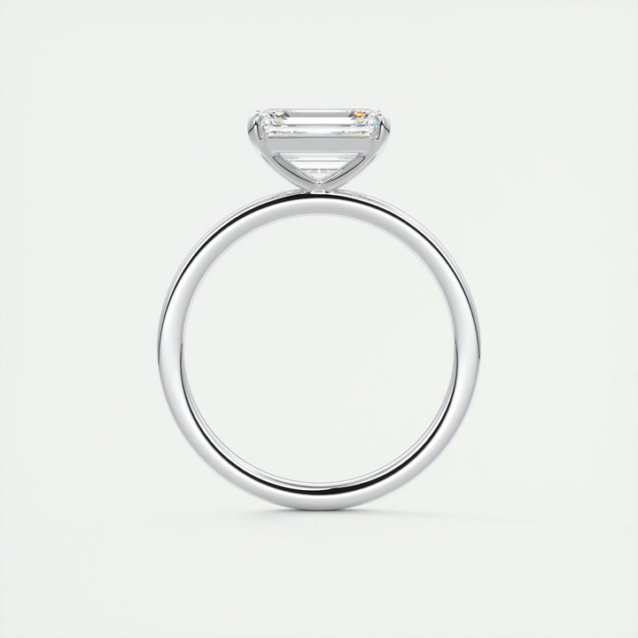 Emerald east west engagement ring with certified lab grown diamond