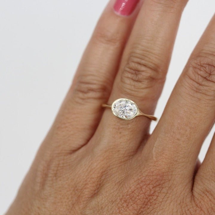 Buy oval cut bezel diamond engagement ring with free shipping