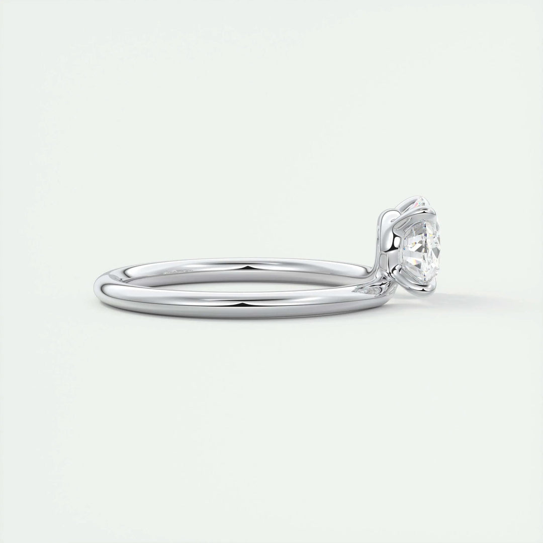 Fine craftsmanship detail on oval east west engagement ring