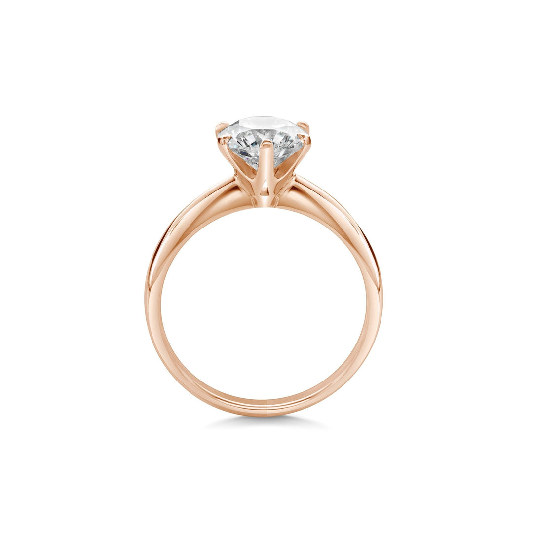 Round cut engagement ring side view showing band detail