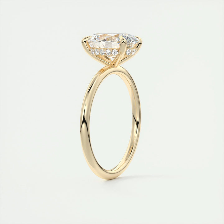 Close-up of oval cut center diamond in hidden halo engagement ring