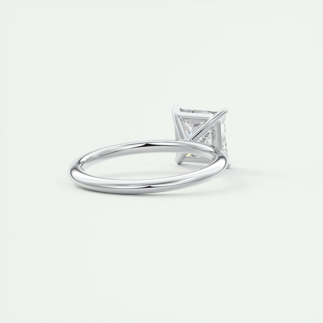 Close-up of princess cut center diamond in solitaire engagement ring