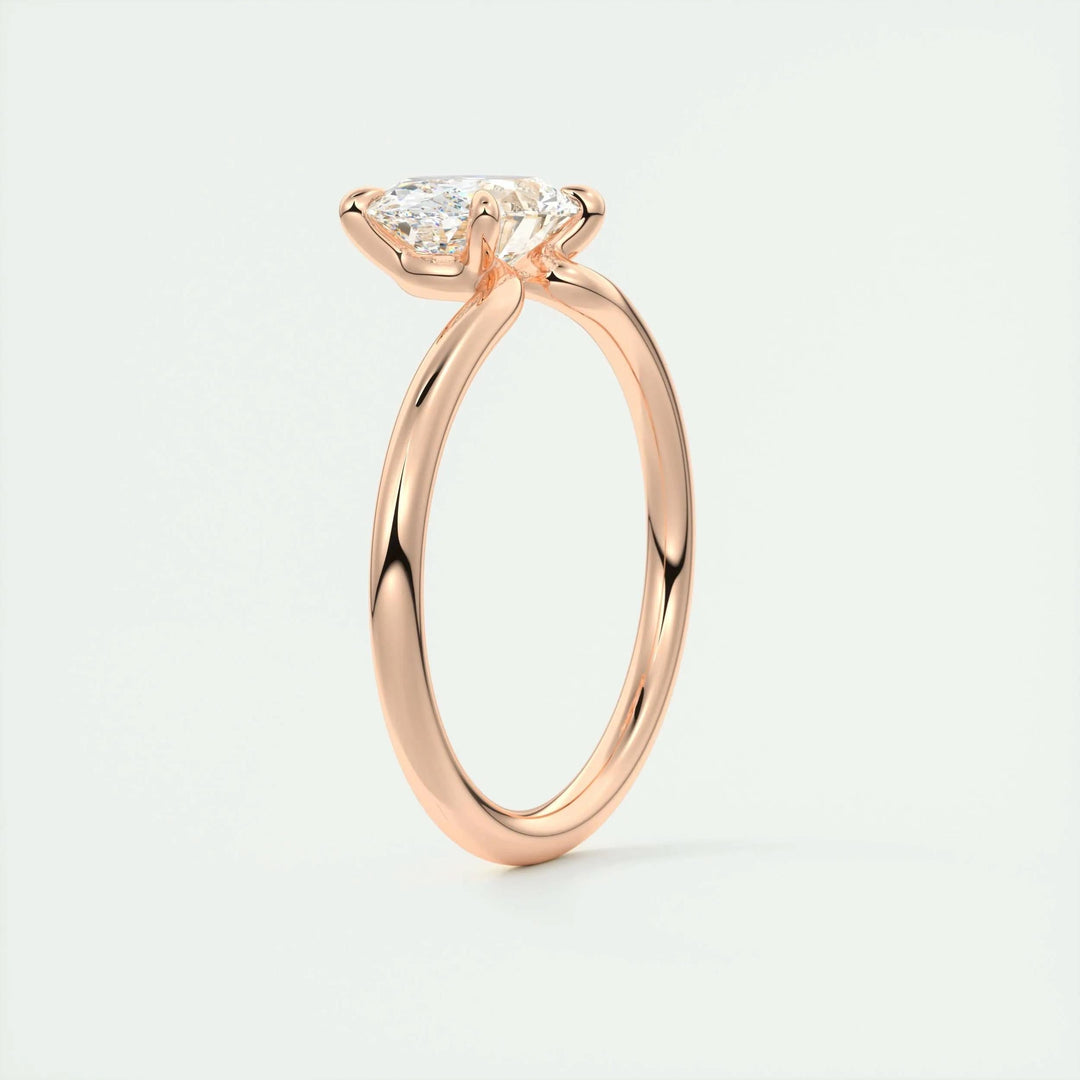 Oval east west engagement ring shown on hand for true-to-life sizing
