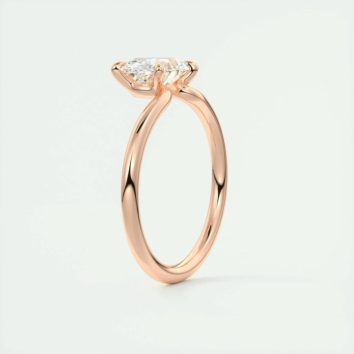Oval east west engagement ring shown on hand for true-to-life sizing