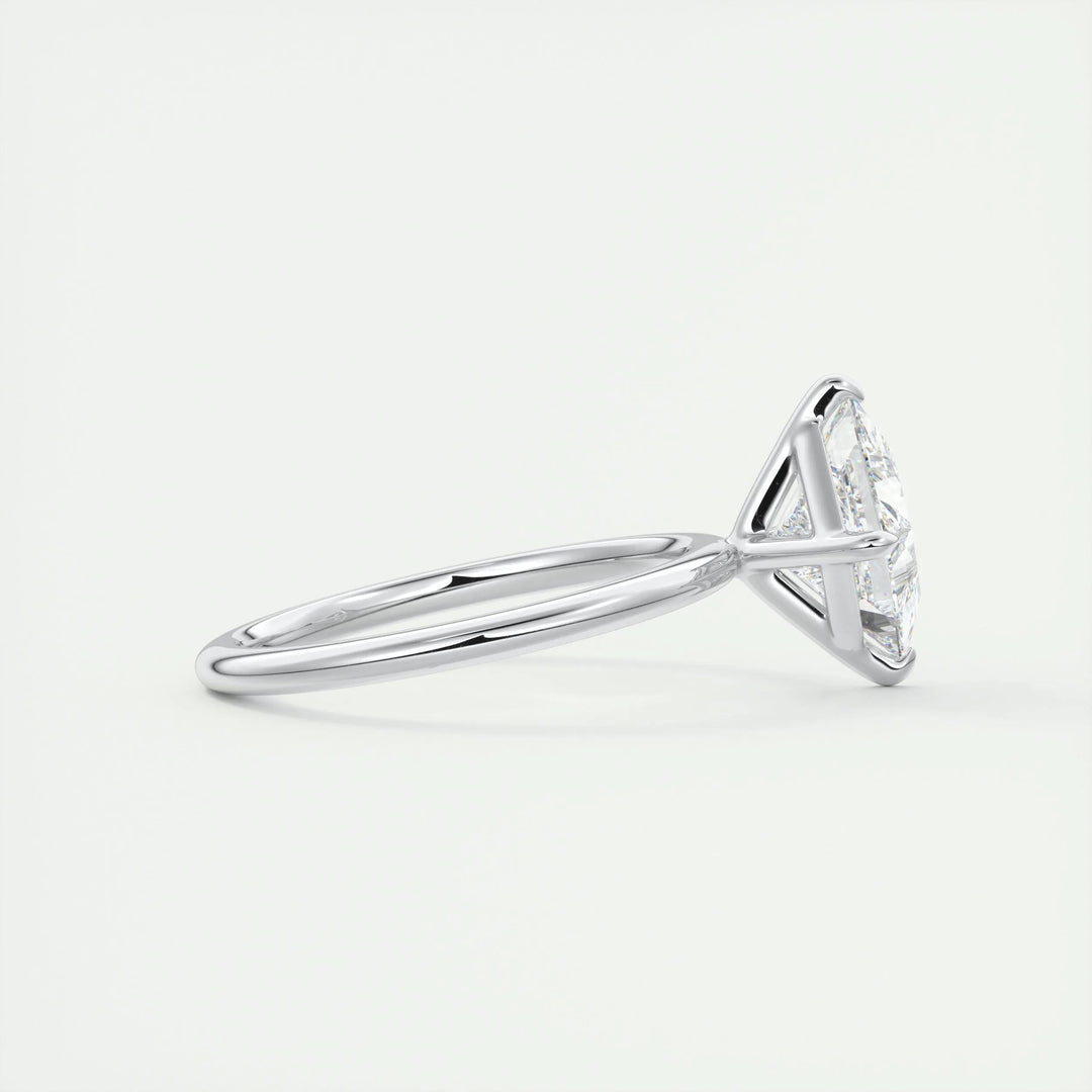 Princess solitaire diamond ring displayed on jewelry stand