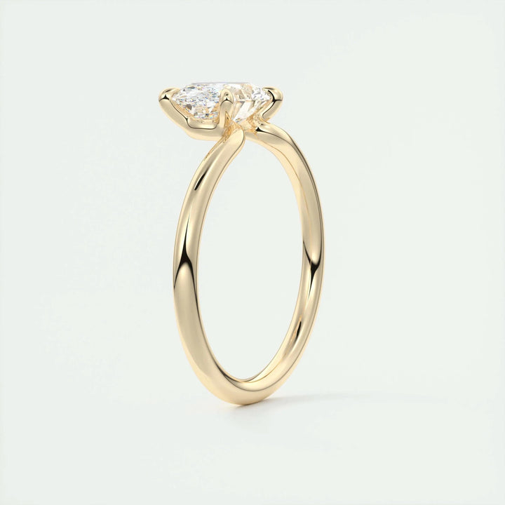 Macro shot of oval cut diamond facets in east west ring setting