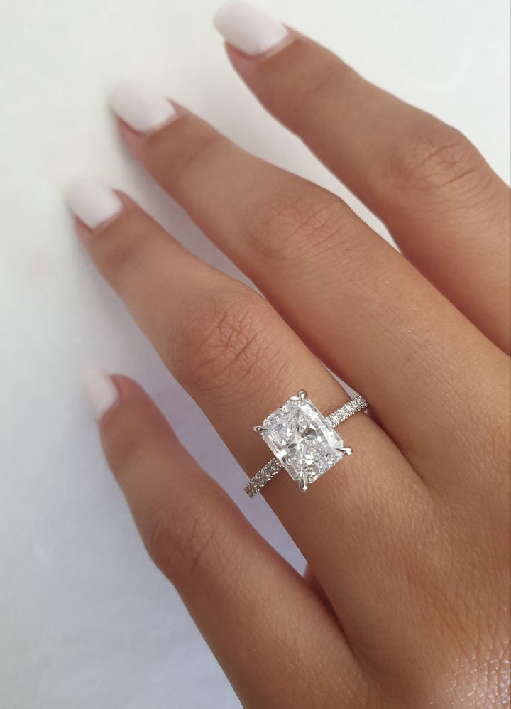Radiant hidden halo engagement ring with IGI certificate and packaging