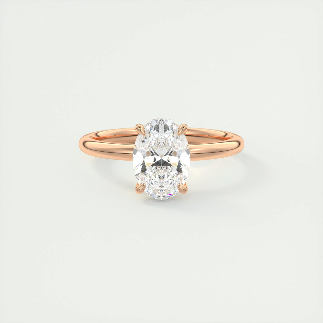 Oval solitaire diamond engagement ring available in multiple metals