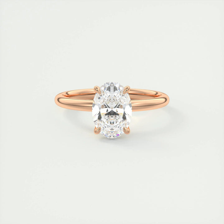 Oval solitaire diamond engagement ring available in multiple metals