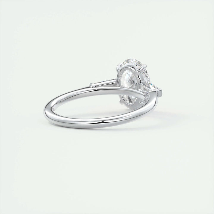 Profile view of oval cut three stone engagement ring band