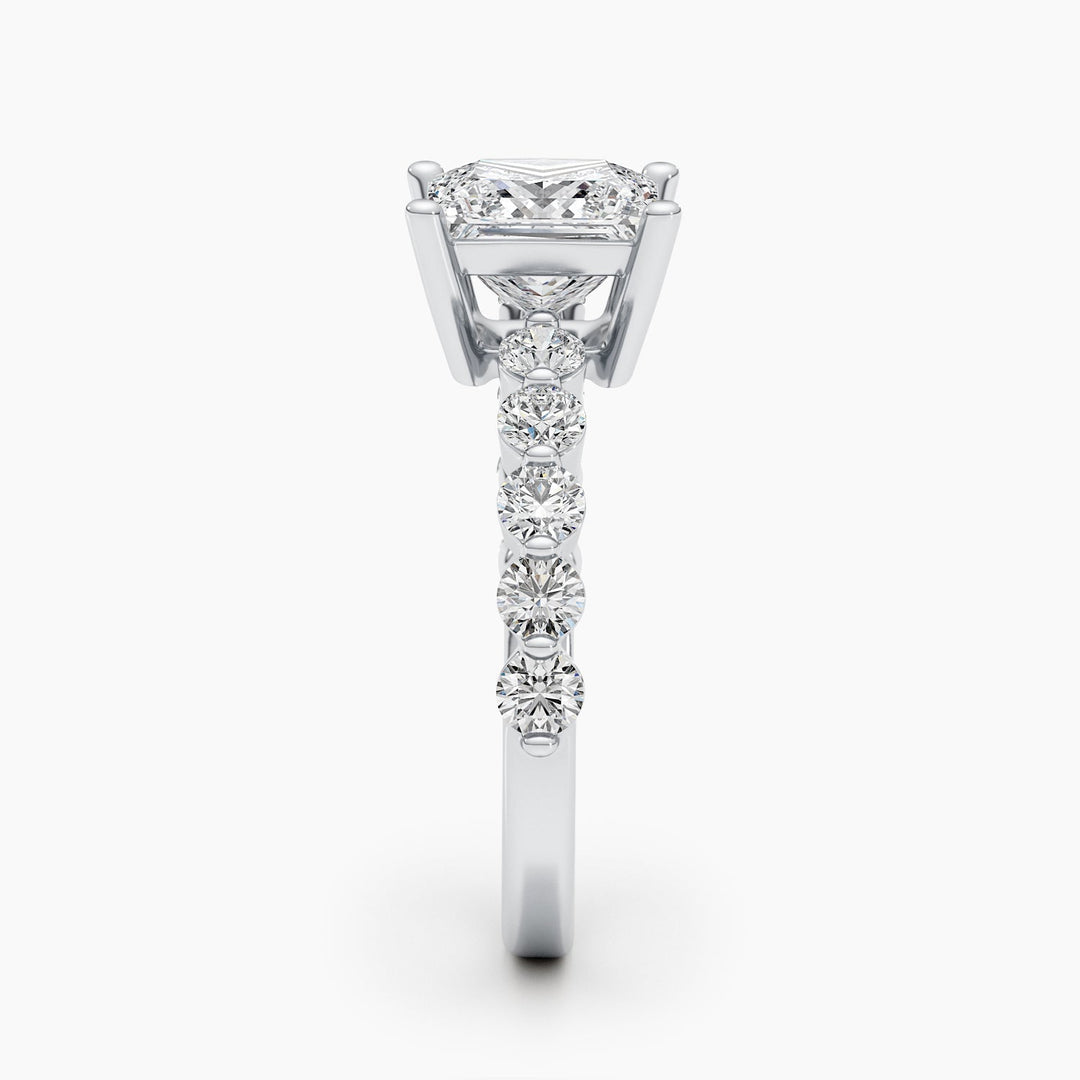 Profile view of princess cut pave engagement ring band