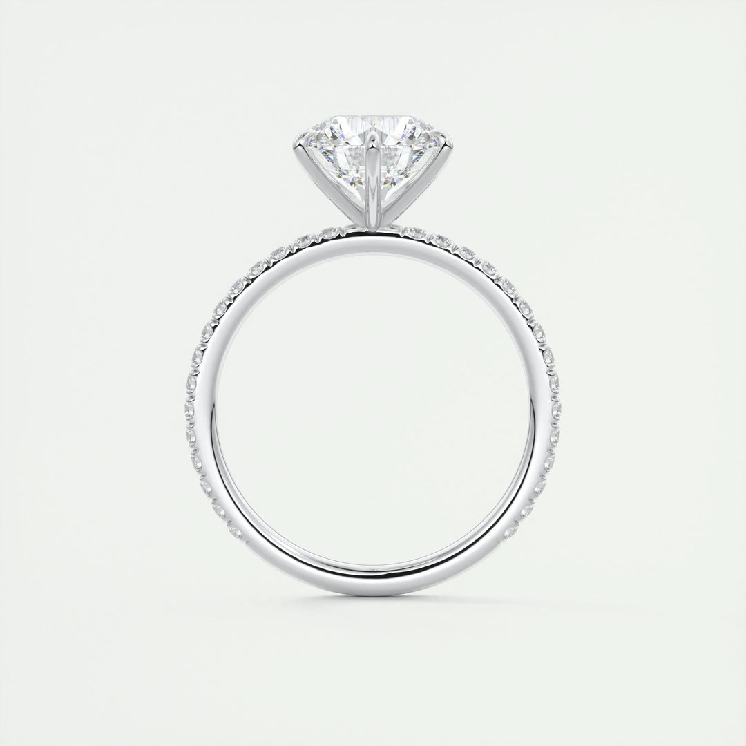 Round pave engagement ring finished in polished solid gold