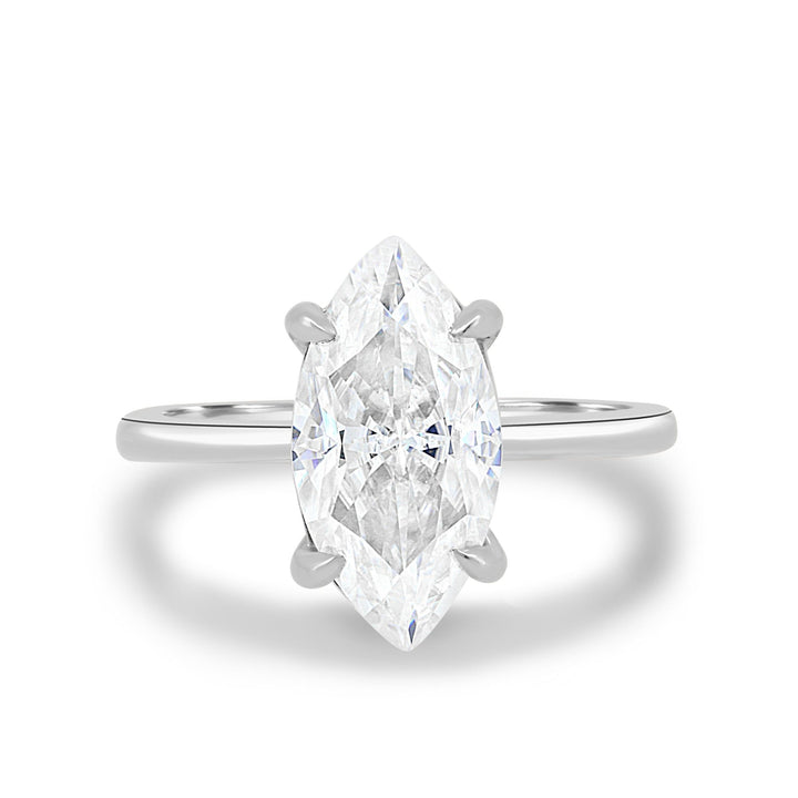 Marquise solitaire ring set with an IGI graded diamond