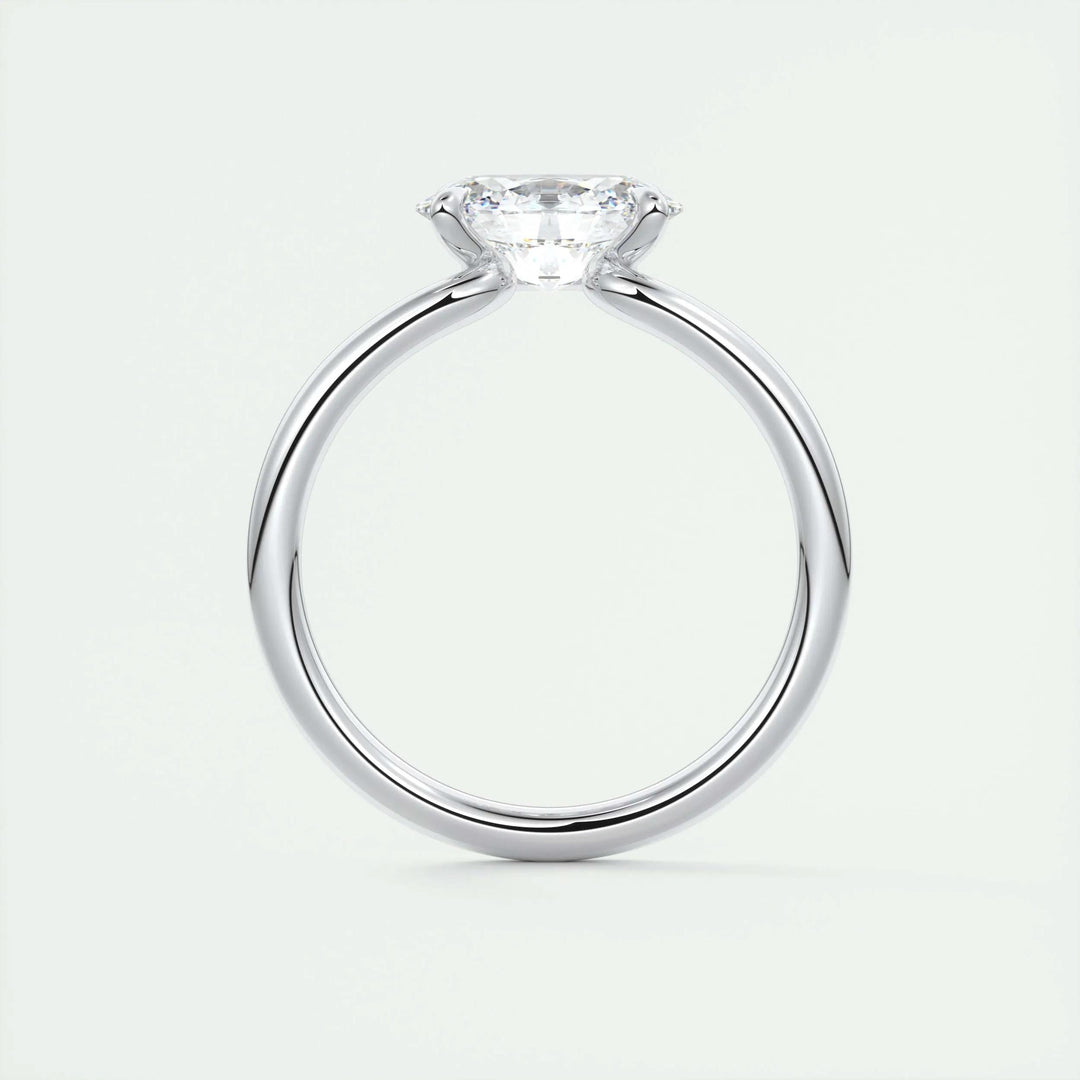 Oval east west diamond ring displayed on jewelry stand