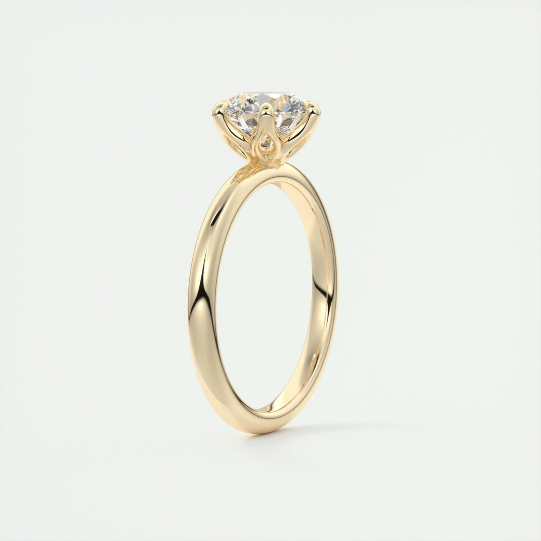 Side angle of round solitaire diamond engagement ring