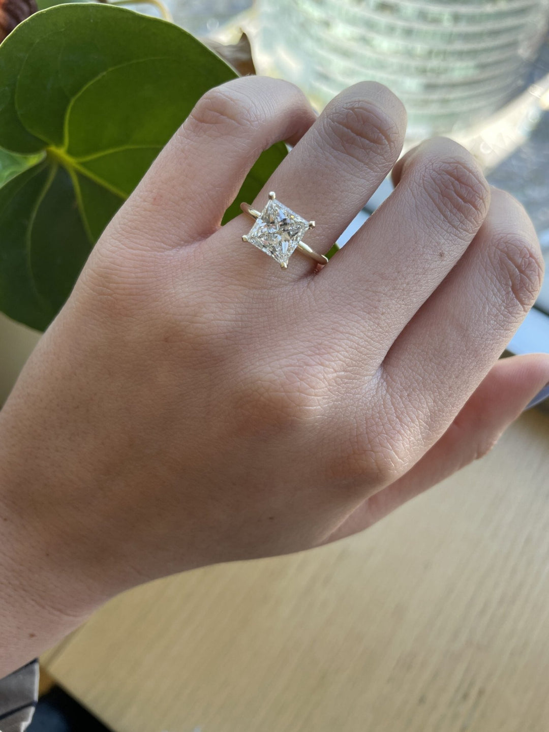 Princess cut solitaire engagement ring with IGI certified center diamond