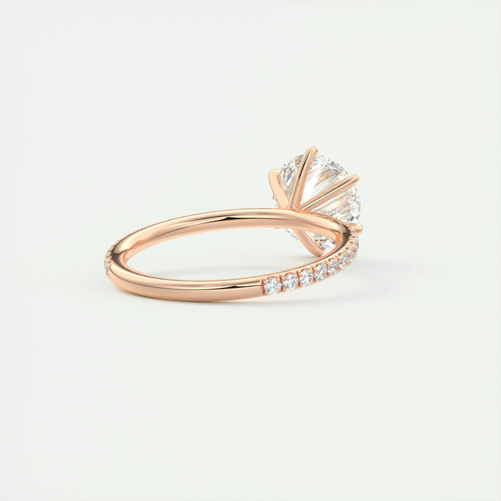 Detailed close-up of round pave diamond engagement ring
