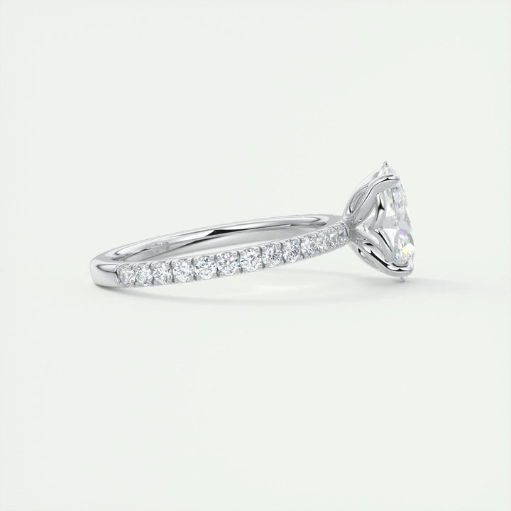 Oval pave engagement ring shown on hand for true-to-life sizing