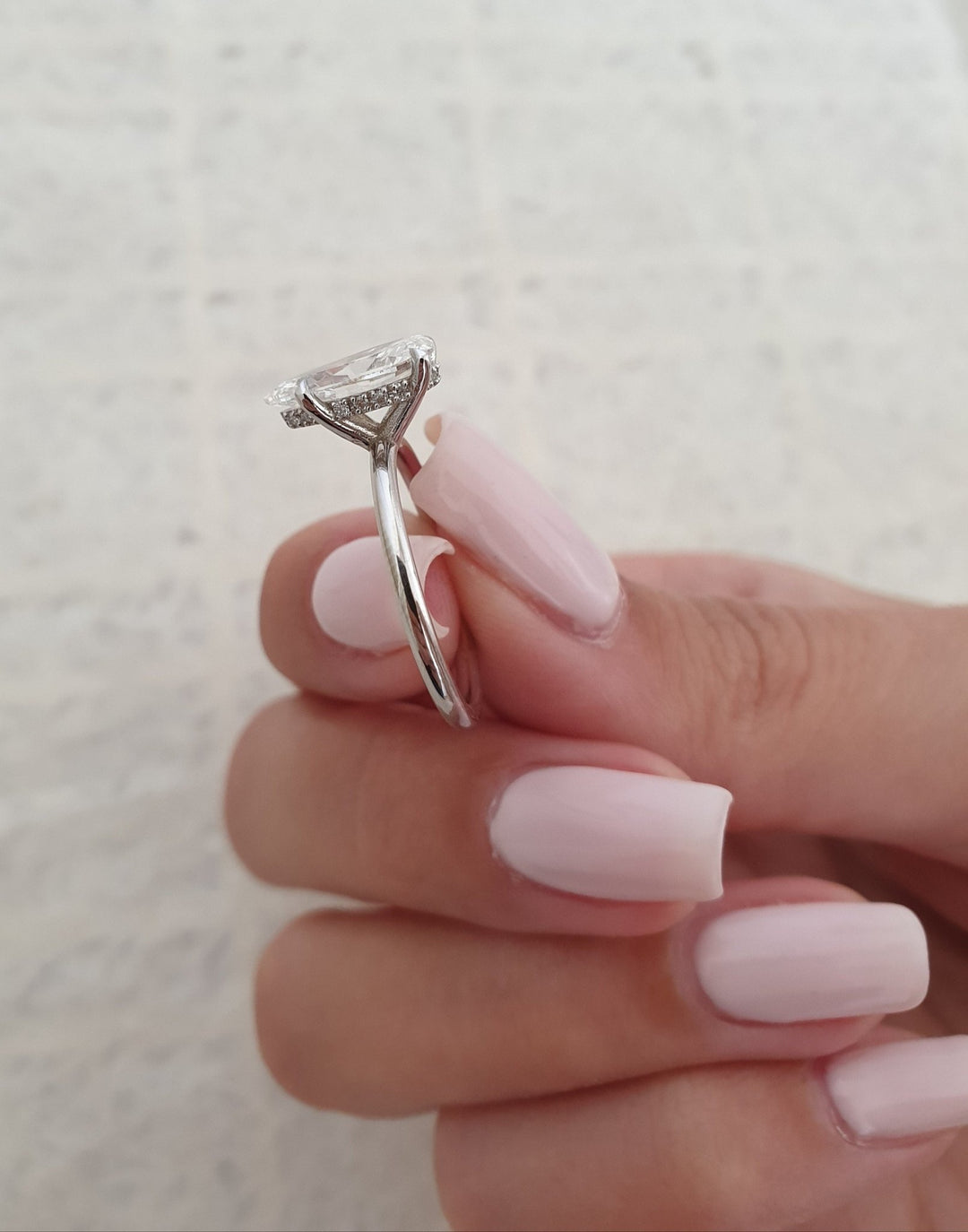 Pear hidden halo lab grown diamond ring in jewelry gift box