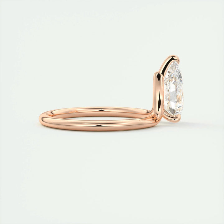 Profile view of pear cut solitaire engagement ring band