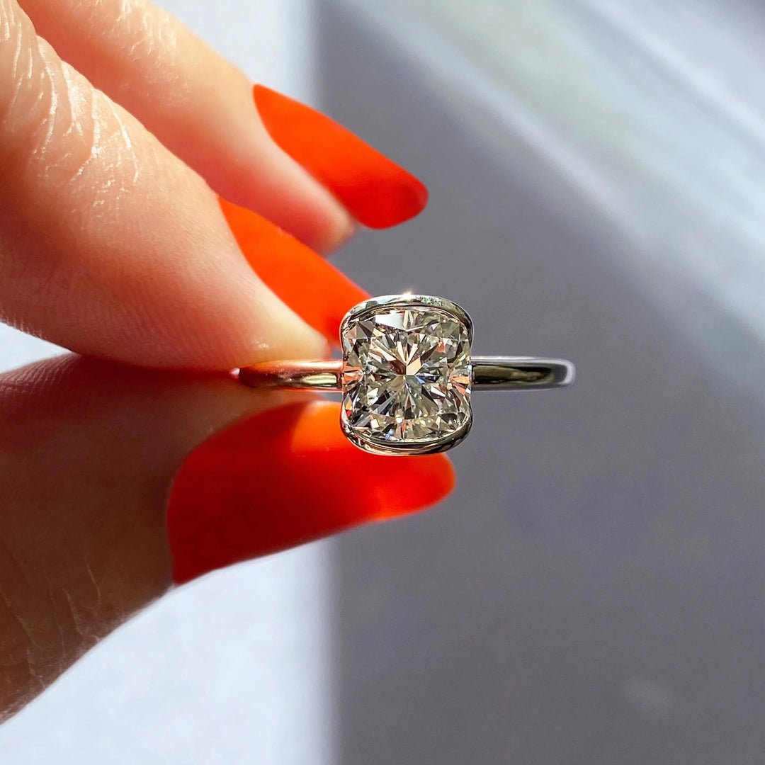 Unboxing view of cushion cut solitaire diamond engagement ring
