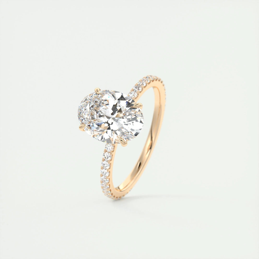 Certified oval cut diamond featured in pave engagement ring