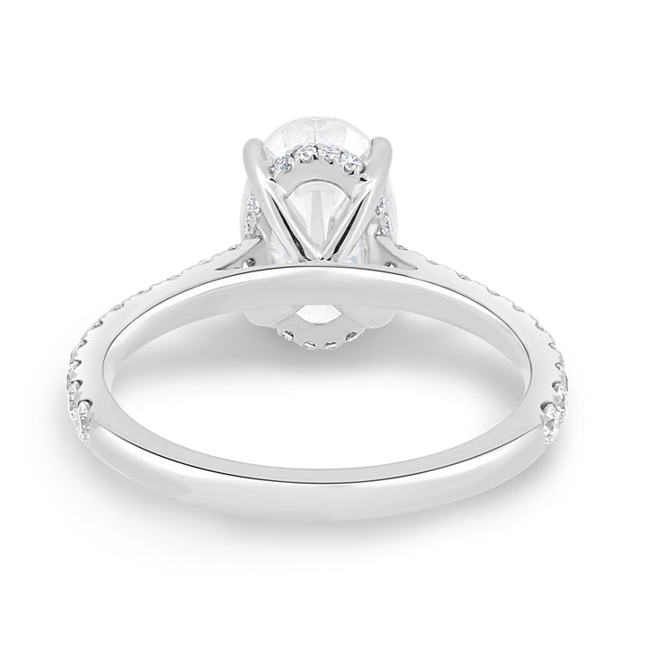 Oval hidden halo engagement ring with brilliant diamond sparkle