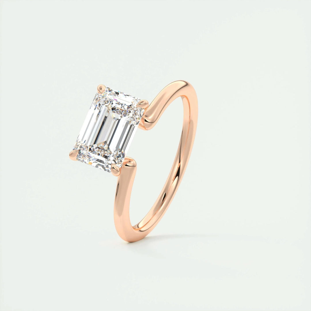 Certified emerald cut diamond featured in solitaire engagement ring