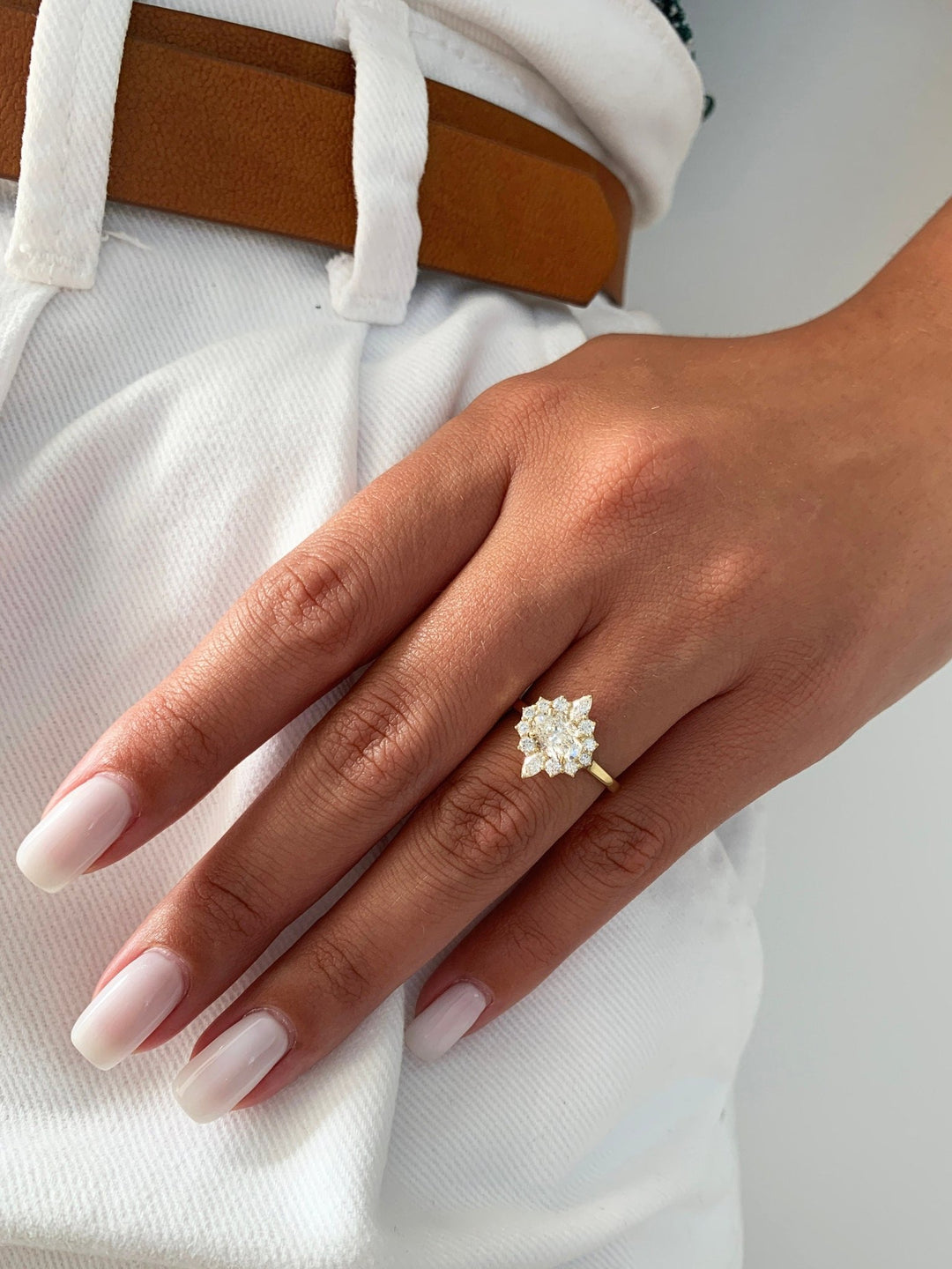 Oval halo lab grown diamond ring side profile in gold setting