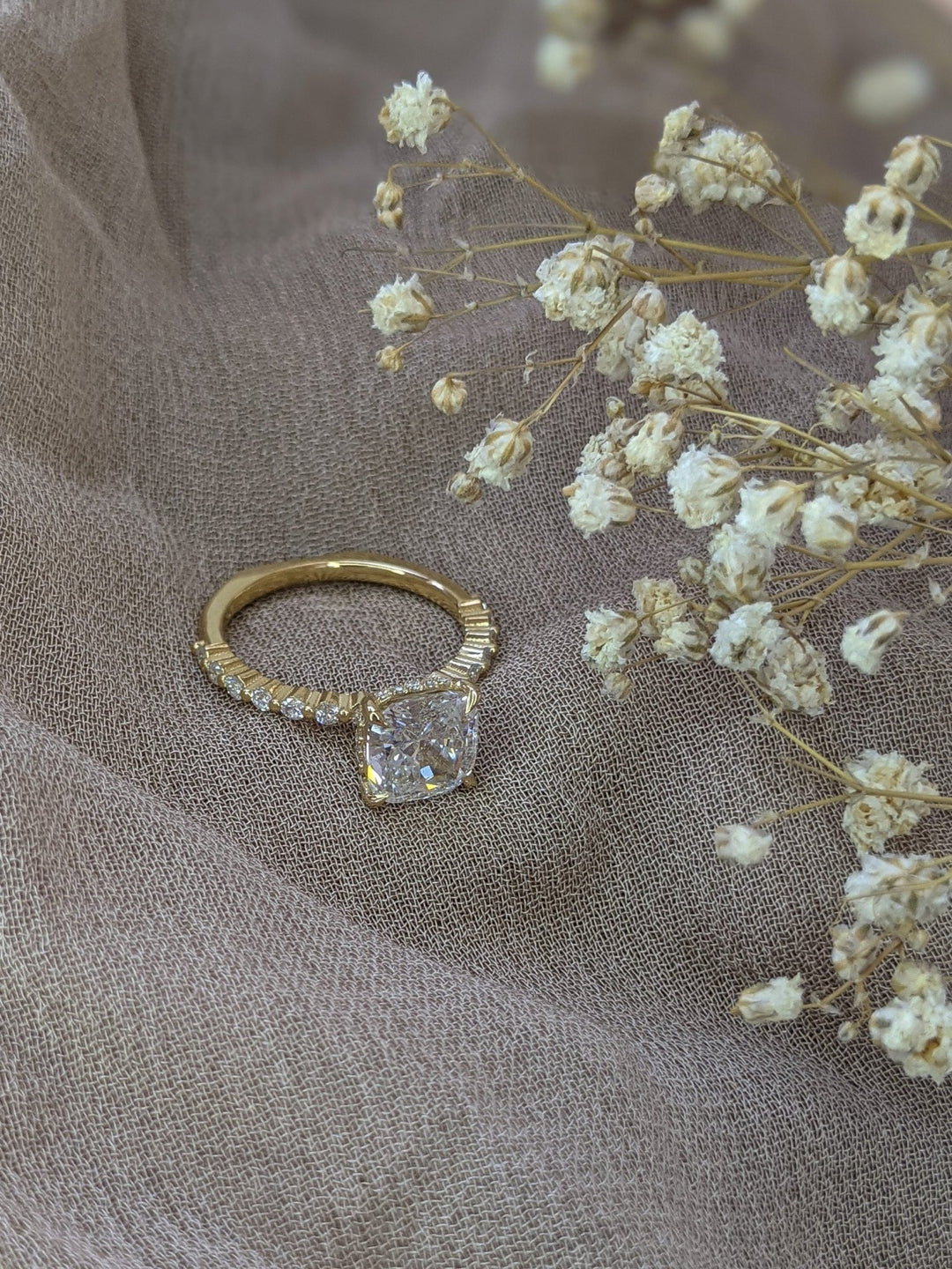 Cushion hidden halo lab grown diamond ring side profile in gold setting