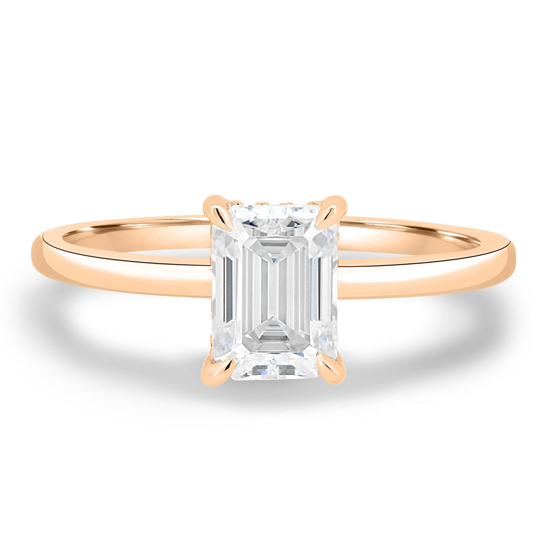 Classic emerald hidden halo engagement ring crafted for everyday wear