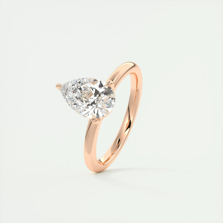Pear cut engagement ring side view showing band detail