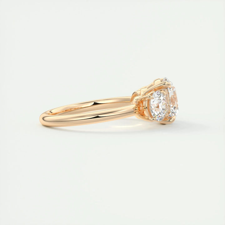 Round three stone engagement ring close-up highlighting diamond sparkle